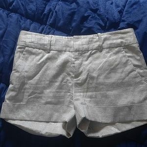Club Monaco white and metallic silver shorts.